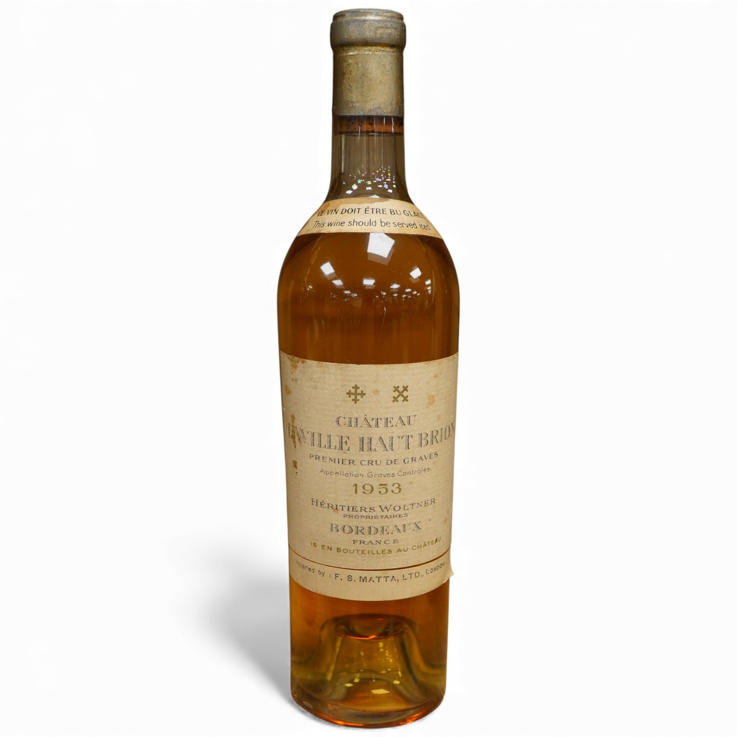 A bottle of Chateau Haut Brion, 1953, imported by FS Matta, London